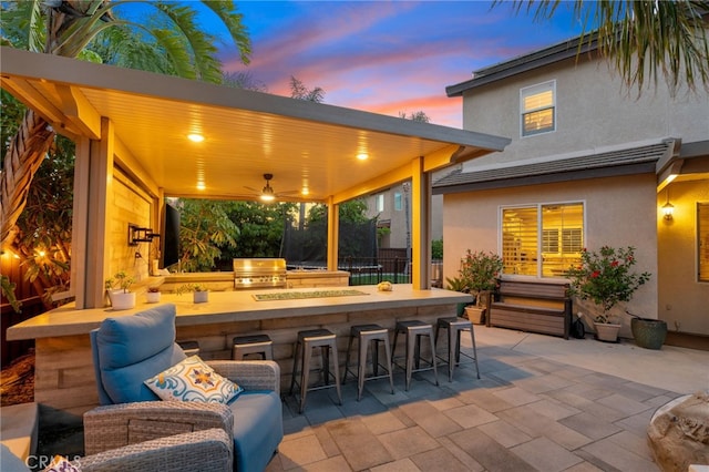 14131 Apple Grove Ct, Eastvale, CA 92880 - view of patio featuring an outdoor kitchen