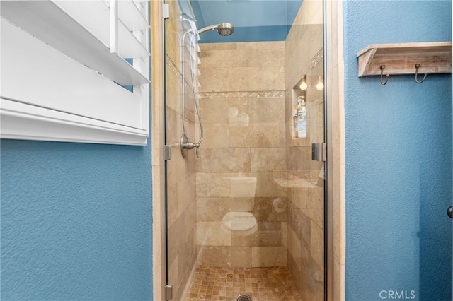 14131 Apple Grove Ct, Eastvale, CA 92880 - bathroom with a textured wall and a shower stall