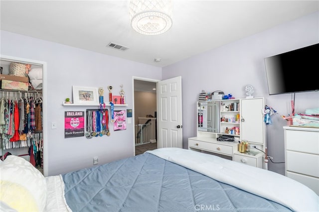 14131 Apple Grove Ct, Eastvale, CA 92880 - bedroom featuring a spacious closet and a closet