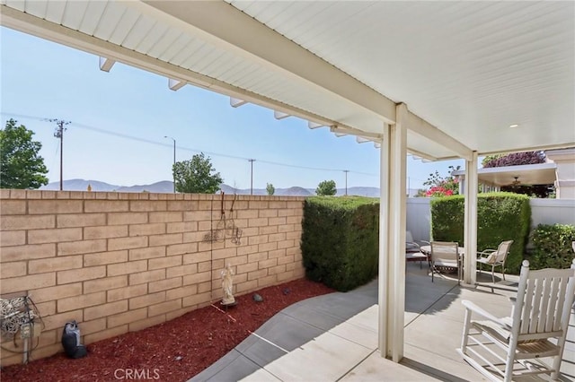 1627 Camino Sueno, Hemet, CA 92545 - fenced backyard featuring a patio and a mountain view