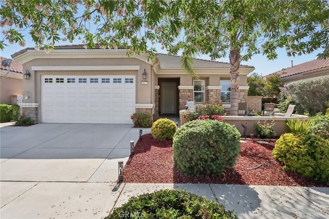 1627 Camino Sueno, Hemet, CA 92545 - view of front of property with stone siding, concrete driveway, and stucco siding