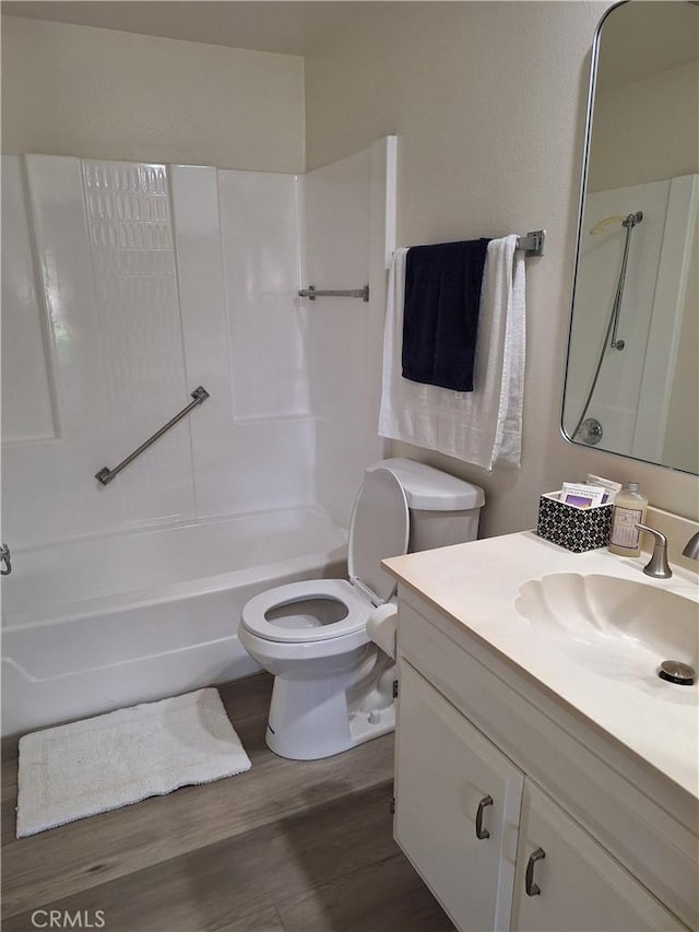 3144 Via Vis Unit Q, Laguna Woods, CA 92637 - bathroom with wood finished floors, vanity, and tub / shower combination