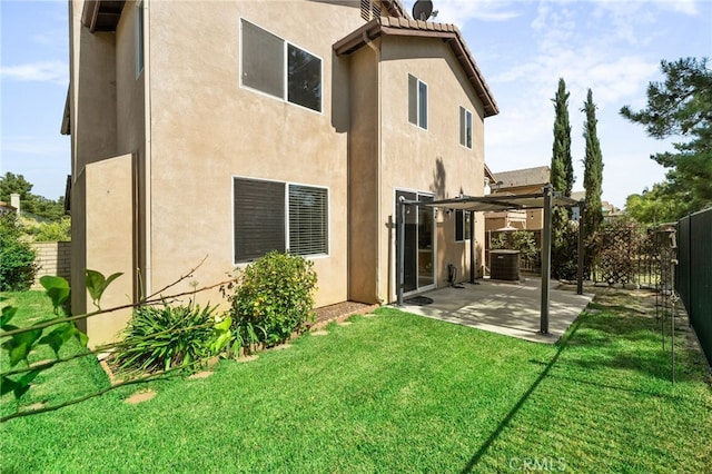 11890 Greenbluff Way, Yucaipa, CA 92399 - rear view of house featuring stucco siding, a pergola, a fenced backyard, and a patio