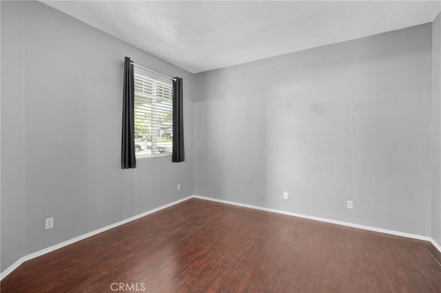 11890 Greenbluff Way, Yucaipa, CA 92399 - spare room with dark wood finished floors and baseboards