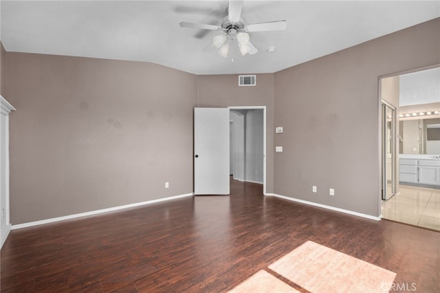 11890 Greenbluff Way, Yucaipa, CA 92399 - unfurnished bedroom featuring wood finished floors, a ceiling fan, and connected bathroom