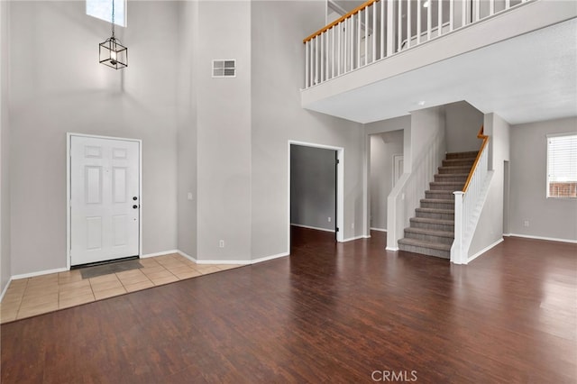 11890 Greenbluff Way, Yucaipa, CA 92399 - entryway featuring a high ceiling, wood finished floors, and stairway