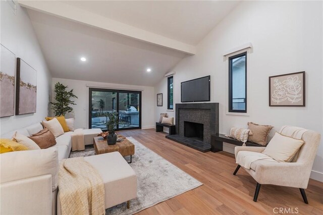 35 Beachcomber Dr, Corona Del Mar, CA 92625 - living room featuring light wood finished floors, recessed lighting, and a tiled fireplace