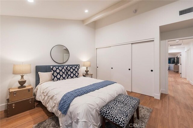 35 Beachcomber Dr, Corona Del Mar, CA 92625 - bedroom with light wood finished floors, a closet, and recessed lighting