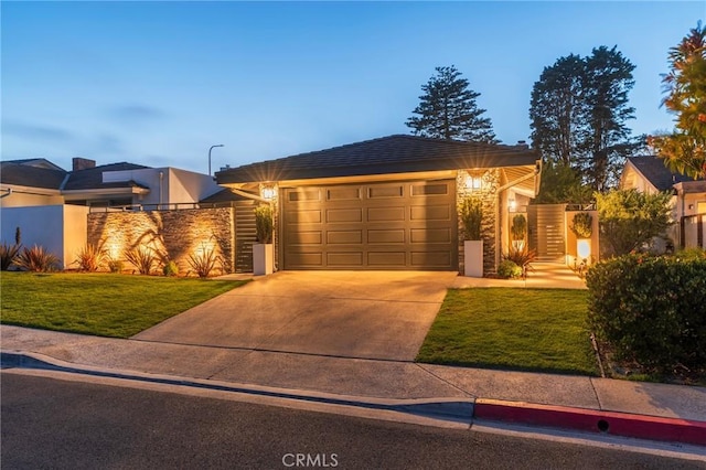 35 Beachcomber Dr, Corona Del Mar, CA 92625 - view of front of house with an attached garage, concrete driveway, stone siding, a front yard, and stucco siding