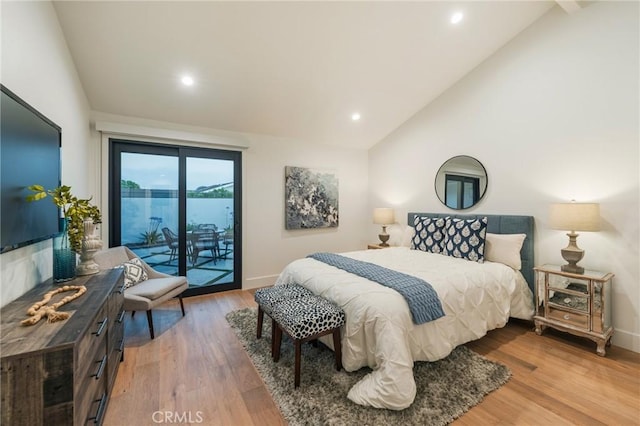 35 Beachcomber Dr, Corona Del Mar, CA 92625 - bedroom featuring lofted ceiling, access to exterior, wood finished floors, and recessed lighting
