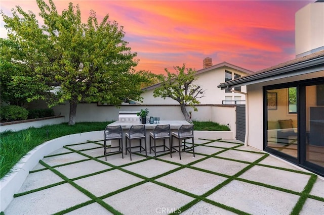 35 Beachcomber Dr, Corona Del Mar, CA 92625 - patio terrace at dusk featuring a patio area
