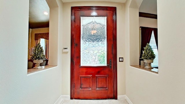6130 Paseo Monona, Carlsbad, CA 92009 - entrance foyer featuring arched walkways and baseboards