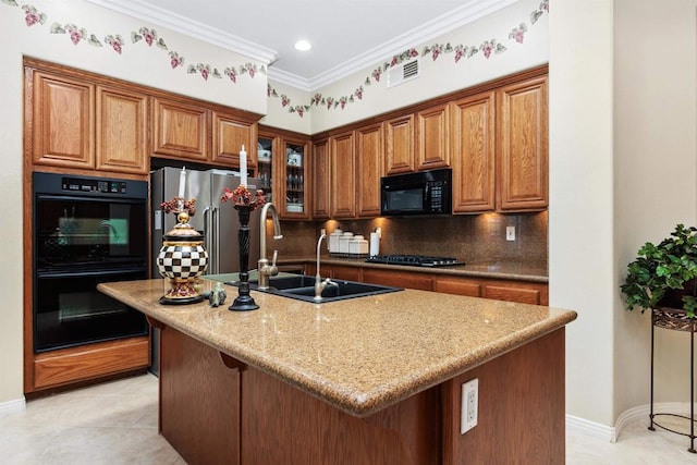 6130 Paseo Monona, Carlsbad, CA 92009 - kitchen with black appliances, decorative backsplash, brown cabinetry, and crown molding