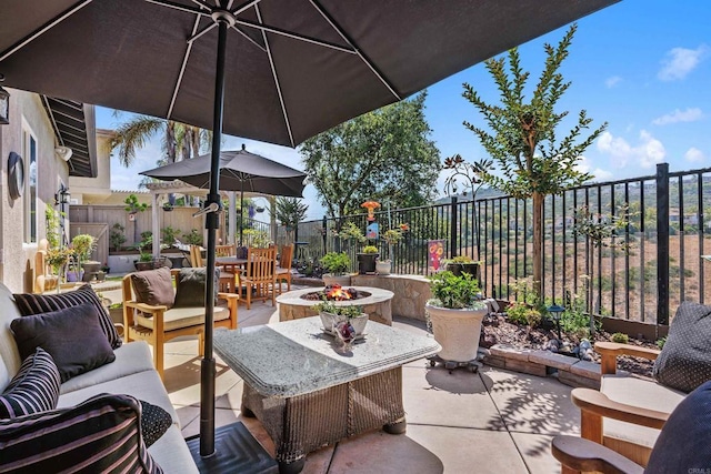 6130 Paseo Monona, Carlsbad, CA 92009 - fenced backyard with an outdoor living space with a fire pit and a patio