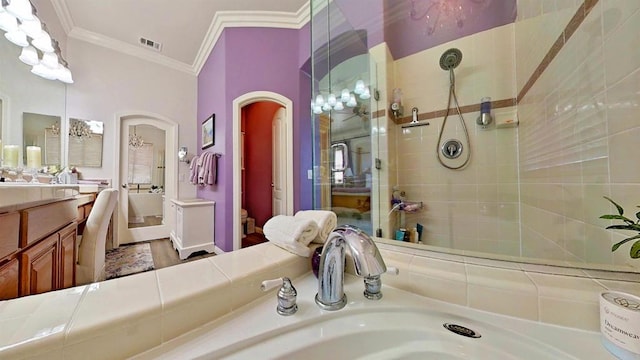 6130 Paseo Monona, Carlsbad, CA 92009 - bathroom featuring vanity, crown molding, tiled shower, and a bath