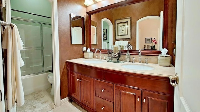 6130 Paseo Monona, Carlsbad, CA 92009 - bathroom with double vanity, bath / shower combo with glass door, tile patterned floors, and a textured wall
