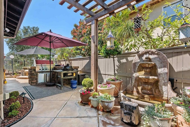 6130 Paseo Monona, Carlsbad, CA 92009 - fenced backyard featuring area for grilling, a pergola, and a patio area