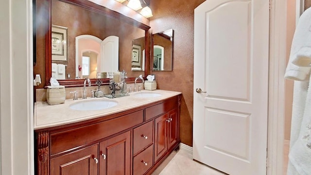 6130 Paseo Monona, Carlsbad, CA 92009 - bathroom with double vanity, a textured wall, and tile patterned flooring