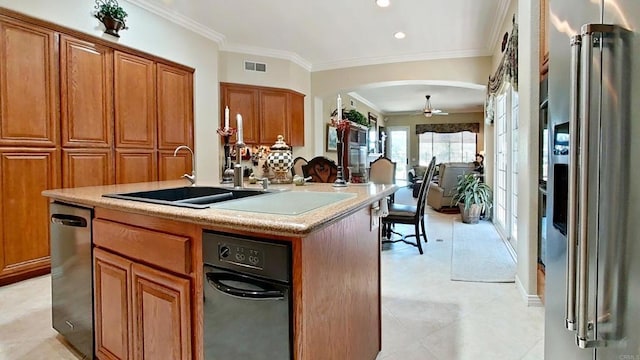 6130 Paseo Monona, Carlsbad, CA 92009 - kitchen with stainless steel appliances, brown cabinetry, ornamental molding, a kitchen island with sink, and arched walkways