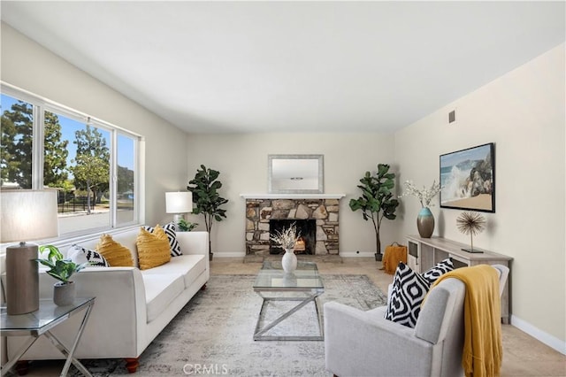 18643 Las Flores St, Fountain Valley, CA 92708 - living area featuring baseboards and a fireplace
