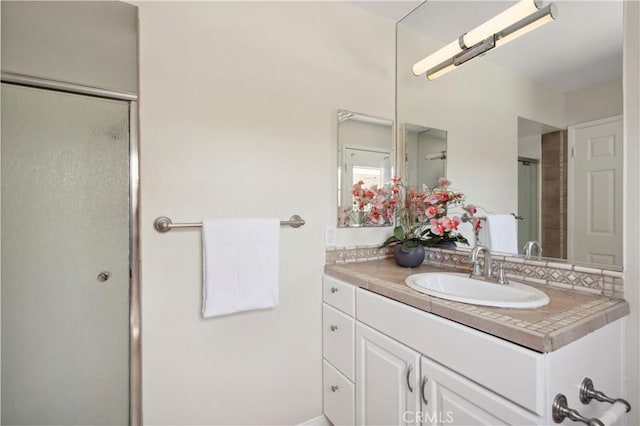 18643 Las Flores St, Fountain Valley, CA 92708 - full bath featuring vanity and a shower with door