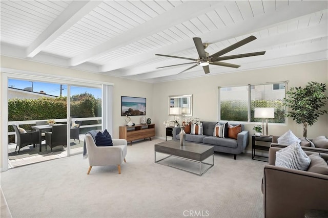 18643 Las Flores St, Fountain Valley, CA 92708 - living room with beamed ceiling, healthy amount of natural light, light colored carpet, and ceiling fan