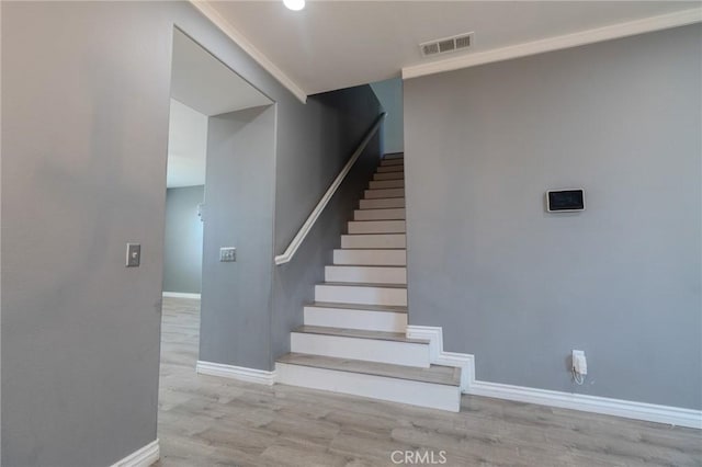 13740 Starshine Dr, Victorville, CA 92392 - stairway featuring baseboards and wood finished floors