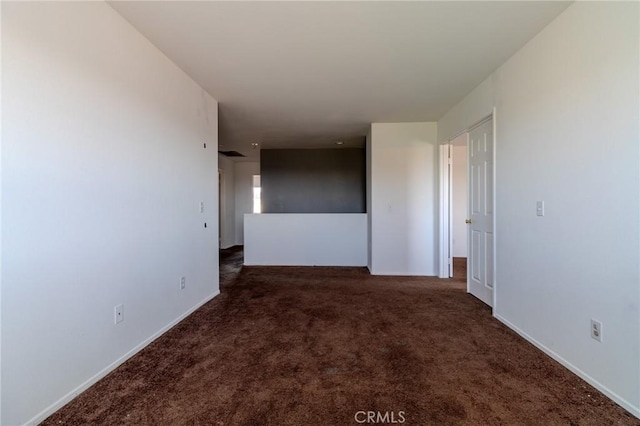 13740 Starshine Dr, Victorville, CA 92392 - unfurnished room with carpet and baseboards