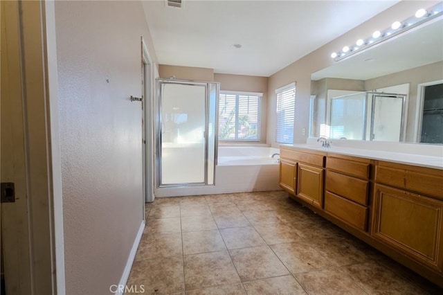13740 Starshine Dr, Victorville, CA 92392 - full bath featuring a shower stall, a bath, vanity, and tile patterned floors
