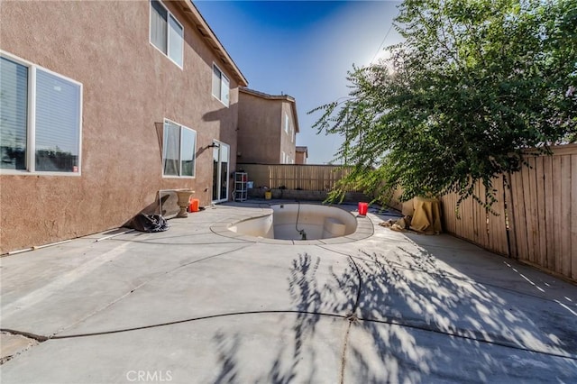 13740 Starshine Dr, Victorville, CA 92392 - fenced backyard featuring a patio area