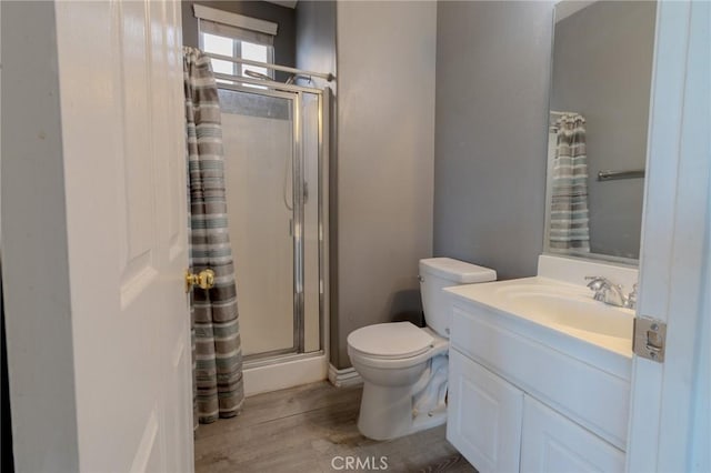 13740 Starshine Dr, Victorville, CA 92392 - bathroom with a shower stall, vanity, and wood finished floors