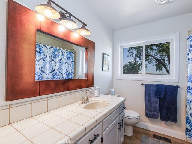 7491 Kingsbury Rd, Templeton, CA 93465 - full bath with vanity and wood finished floors