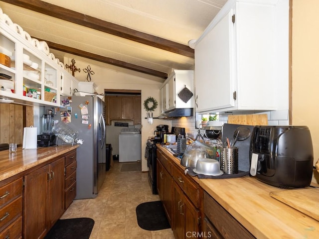 7491 Kingsbury Rd, Templeton, CA 93465 - kitchen with washer / dryer, white cabinetry, light tile patterned floors, stainless steel fridge with ice dispenser, and backsplash