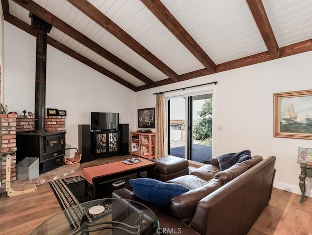 7491 Kingsbury Rd, Templeton, CA 93465 - living room featuring wood finished floors, a wood stove, a wood ceiling with exposed beams, and high vaulted ceiling