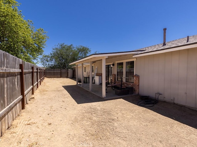 7491 Kingsbury Rd, Templeton, CA 93465 - fenced backyard featuring a patio area
