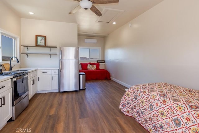 7491 Kingsbury Rd, Templeton, CA 93465 - kitchen featuring appliances with stainless steel finishes, open shelves, white cabinets, light countertops, and recessed lighting