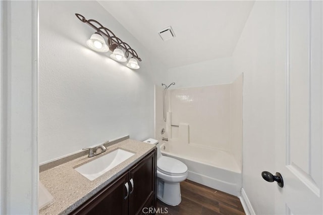 40132 White Leaf Ln, Murrieta, CA 92562 - bathroom with vanity, wood finished floors, and bathtub / shower combination
