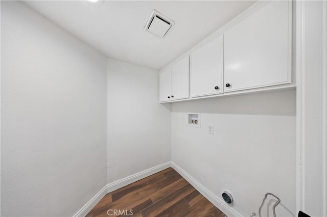 40132 White Leaf Ln, Murrieta, CA 92562 - washroom featuring cabinet space, washer hookup, and dark wood-style flooring