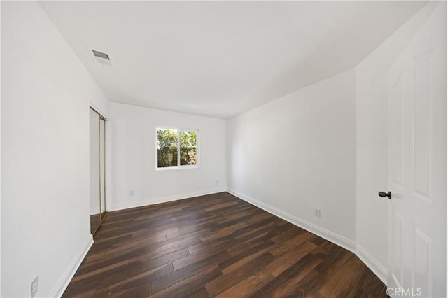 40132 White Leaf Ln, Murrieta, CA 92562 - empty room featuring dark wood finished floors and baseboards