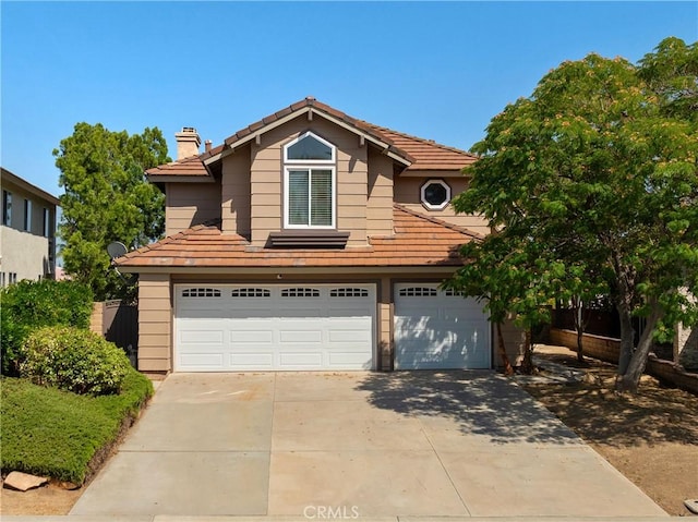 40132 White Leaf Ln, Murrieta, CA 92562 - traditional home with a tile roof, a chimney, concrete driveway, and an attached garage