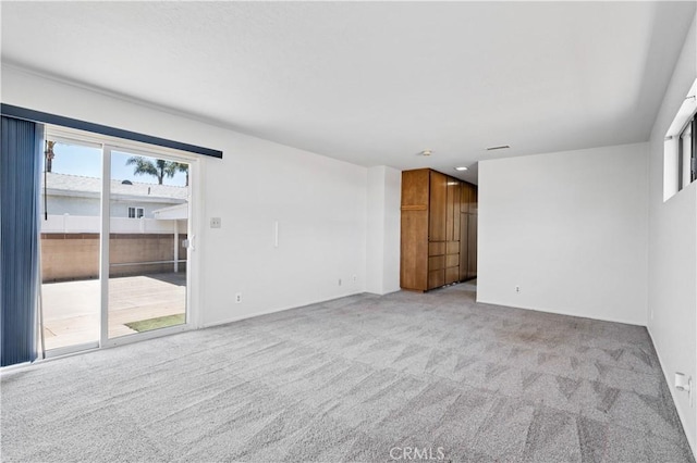 513 W D St, Wilmington, CA 90744 - spare room featuring light colored carpet