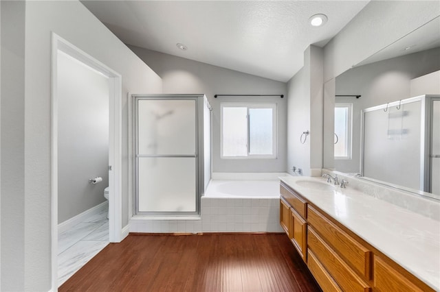 7250 Goldboro Ln, Riverside, CA 92506 - full bathroom with a shower stall, a bath, vanity, lofted ceiling, and wood finished floors