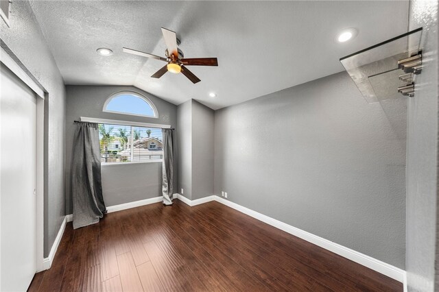 7250 Goldboro Ln, Riverside, CA 92506 - spare room with a ceiling fan, vaulted ceiling, and dark wood finished floors