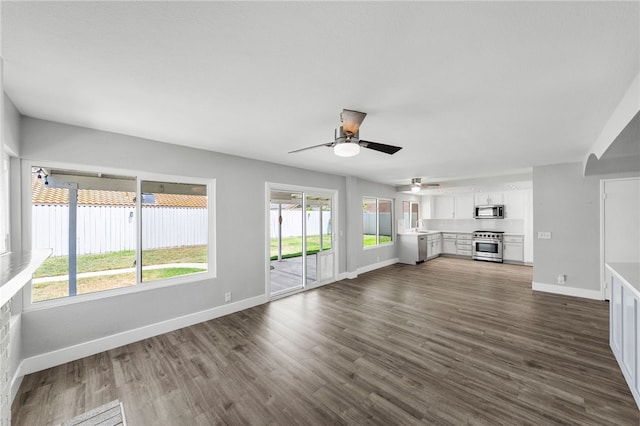 7250 Goldboro Ln, Riverside, CA 92506 - unfurnished living room with a ceiling fan and dark wood-style floors