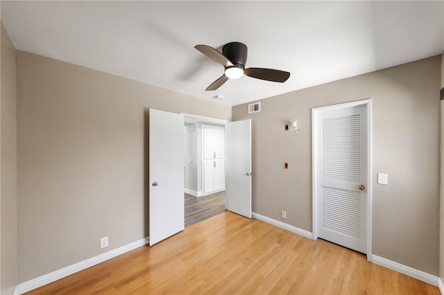 7250 Goldboro Ln, Riverside, CA 92506 - unfurnished bedroom featuring light wood finished floors, a ceiling fan, and a closet
