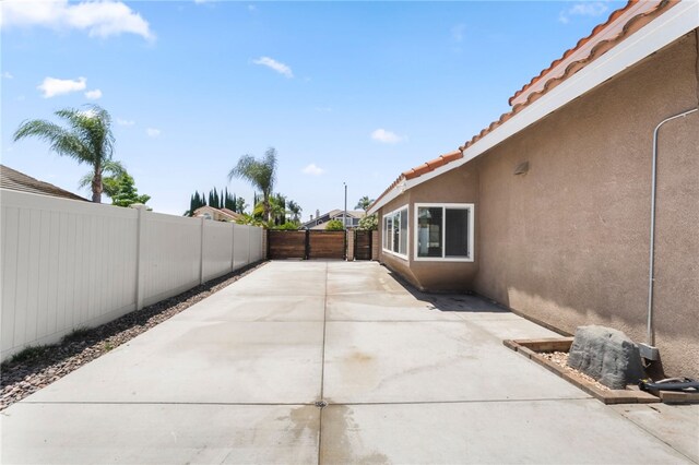 7250 Goldboro Ln, Riverside, CA 92506 - fenced backyard with a patio area