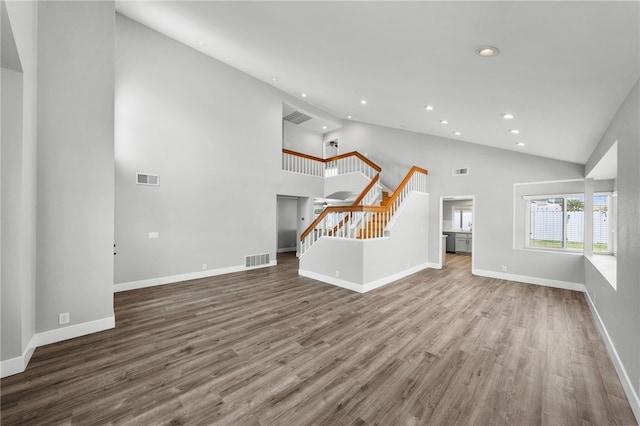 7250 Goldboro Ln, Riverside, CA 92506 - unfurnished living room with stairway, recessed lighting, high vaulted ceiling, and wood finished floors