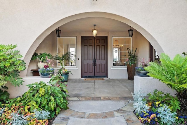 7603 Circulo Sequoia, Carlsbad, CA 92009 - doorway to property featuring stucco siding