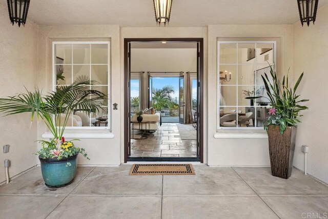 7603 Circulo Sequoia, Carlsbad, CA 92009 - doorway to property featuring stucco siding