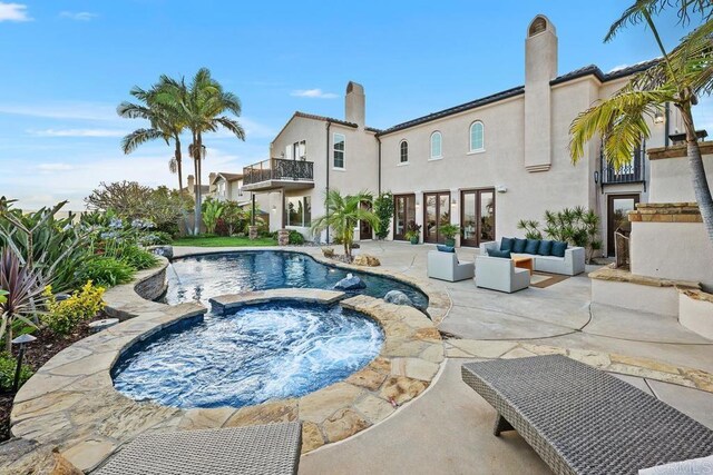 7603 Circulo Sequoia, Carlsbad, CA 92009 - view of swimming pool with a patio area, a pool with connected hot tub, and outdoor lounge area